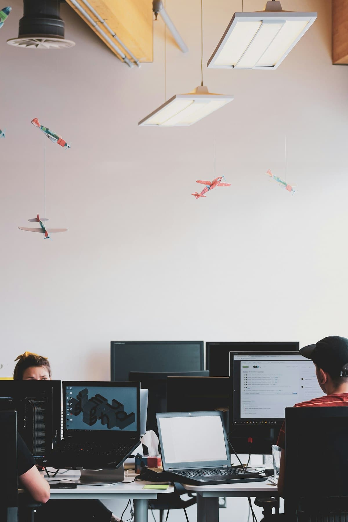 Professional reviewing workflow automation options at a workstation